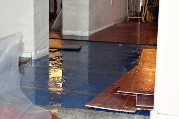 Professional Flood Cleanup technician working in Slinger, WI